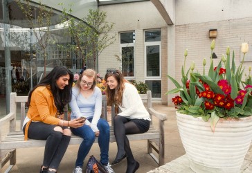 Students outside the front entrance to Murray Edwards College