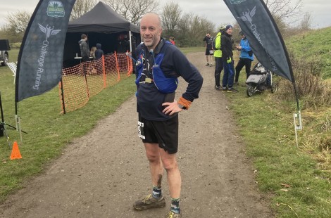 Professor Steve Morris in running clothing after completing a marathon 